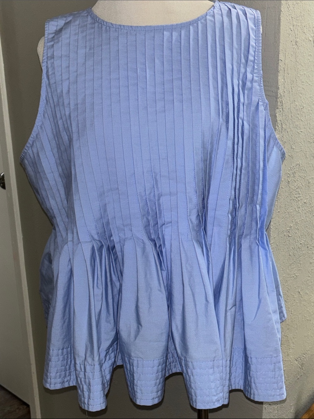 Sleeveless Light Blue Pleated Peplum Top